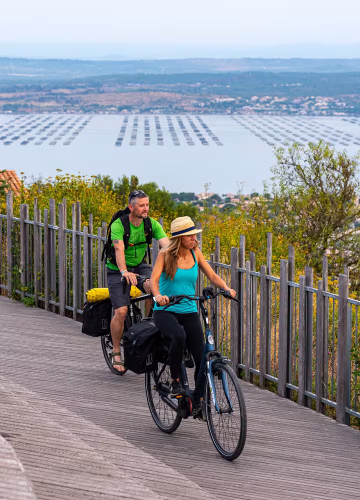 Thau lakes and cyclists